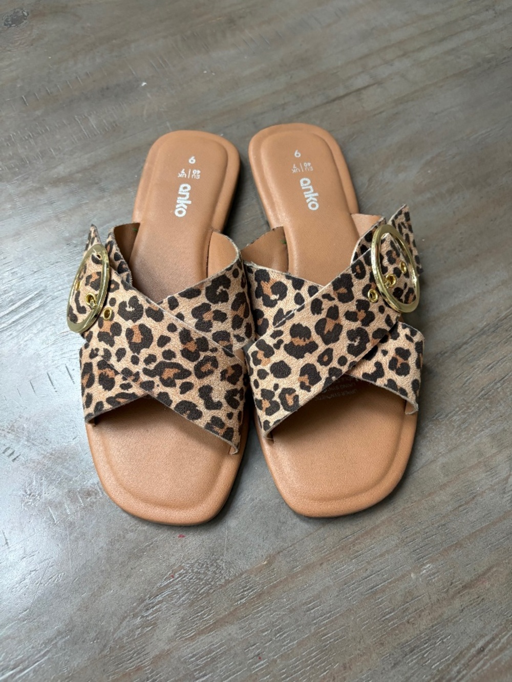 Anko leopard crisscross, slide sandals with gold buckle.